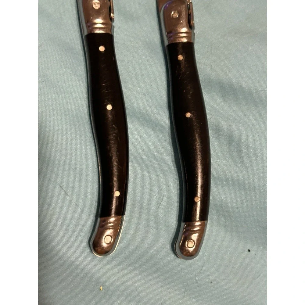 2Farberware 18H769 Fine Serrated Steak Knives,‎ W/ Black Scales